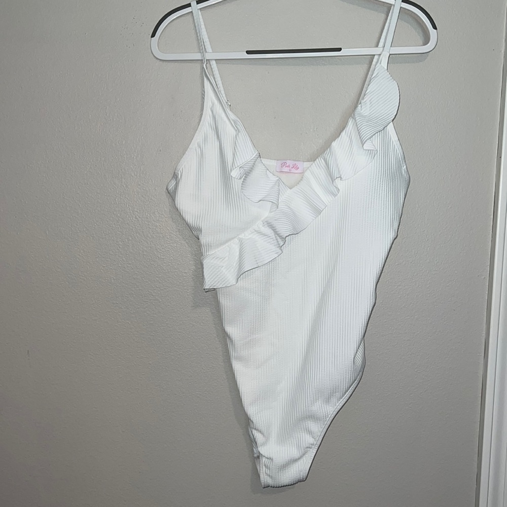 NWT White spaghetti strap Pink Lily ribbed one piece swimsuit. Medium and large.